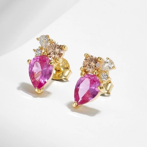 Classic silver teardrop earrings with pink zirconia stones and gold metal finish