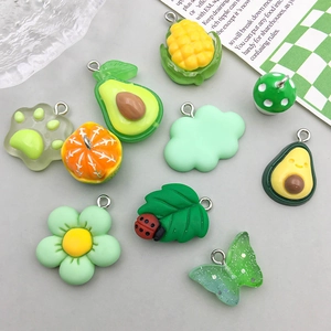 Assorted colorful resin charms featuring fruit, flowers and cloud shapes for DIY jewelry