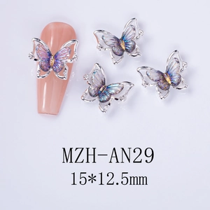 Laser butterfly nail charm 15x12.5mm in purple-blue hue with silver metal frame
