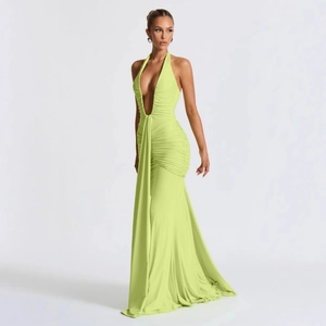 Deep V-neck halter gown with pleated fabric detail and backless design in light green