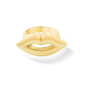 Exaggerated golden lip-shaped ring in polished 18K gold plated stainless steel on white base