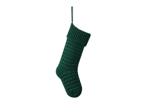 Close-up of forest green cable knit Christmas stocking with textured yarn patterns