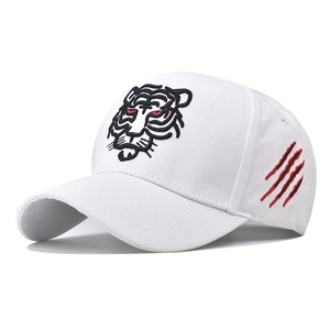 White cotton baseball cap with tiger head embroidery and red scratch marks details