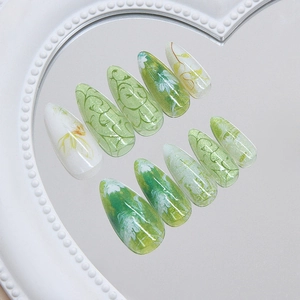 3D cat eye green floral press-on nails with intricate flower vine designs