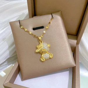 Luxury titanium steel necklace featuring a gold duck pendant fully set with sparkling zircons
