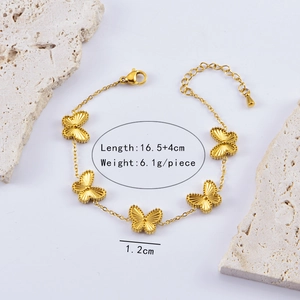 Detail of gold butterfly bracelet with dimensions 16.5 plus 4cm and weight 6.1g