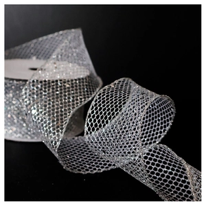 Macro detail of silver glitter mesh ribbon for Christmas tree and gift decoration