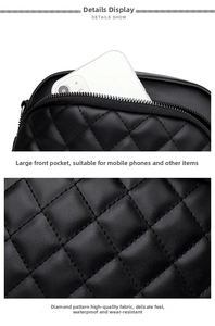 Detail view of black quilted faux leather handbag with spacious front pocket for phones