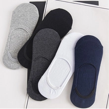 Detailed flat lay of five pairs of cotton blend low cut invisible socks in neutral colors