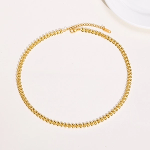 Detailed close-up of 18K gold-plated wheat chain necklace with lobster clasp and extension