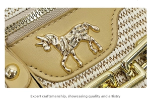 Detail of woven straw and beige leather waist bag with golden horse emblem and zipper