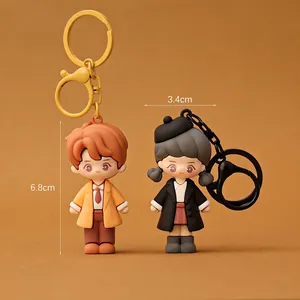 Cute cartoon character couple keychains in soft PVC material for bag charm fashion