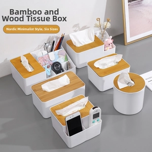 Minimalist white tissue box collection with natural bamboo lids for home organization