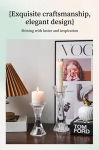 Detail of ribbed clear glass candle holders in two heights for elegant table decor