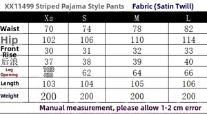 Size chart for vertical striped satin trousers showing detailed waist and length measurements