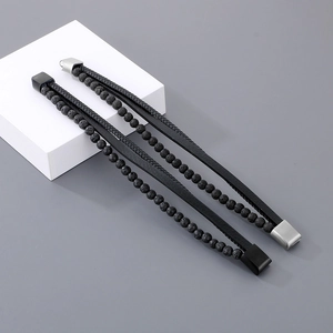 Men's multilayered black lava stone and woven leather bracelet with magnetic clasp
