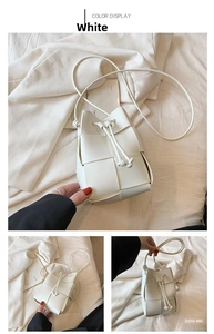 Detail of white wide-weave mini drawstring bucket bag with leather texture and slim strap