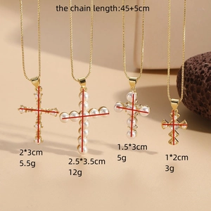 Elegant gold cross pendant necklaces with pearls and zircons in four different sizes