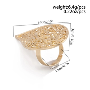 Detail view of adjustable gold leaf ring with precise size and weight measurements