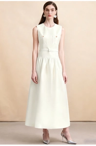 Detail of cream sleeveless dress with fitted waist and matching belt on elegant model