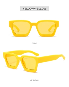 Detail view showing front and 45-degree angle of yellow thick frame square sunglasses