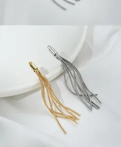 Macro detail of 14K gold and silver plated snake chain tassels for DIY jewelry making