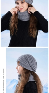 Detail of dark grey knit winter hat and neck warmer set with warm fleece lining texture