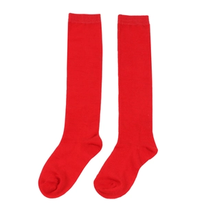 Detailed view of red knitted over-knee socks for kids in a flat lay arrangement