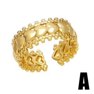 Minimalist gold heart ring with beaded edges and adjustable open band design
