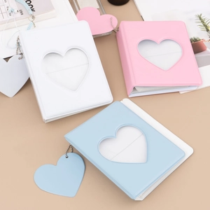 Three macaron mini photo albums with heart window and matching pendant charms