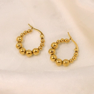 Minimalist gold beaded hoop earrings for women with elegant metallic spherical design