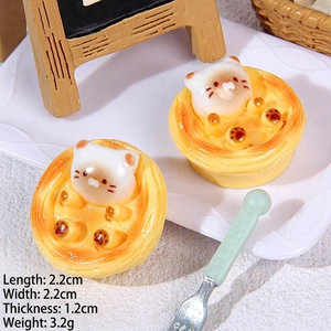 Macro shot of 2.2cm miniature resin cat egg tart charms with size and weight dimensions