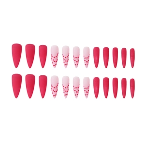 Matte long stiletto press-on nails with red cherry patterns and vibrant pink finish