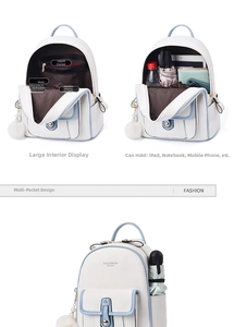 Detail of blue and white backpack interior showing large capacity for iPad and bottle