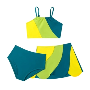Three-piece girls' swimsuit set featuring color-block design and scalloped edge skirt