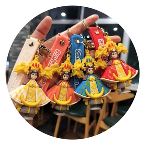 Quatre porte-clés en PVC San Juan de los Lagos aux motifs religieux en gros plan