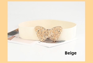 Detail of beige elastic waist belt with a golden hollow butterfly metal buckle