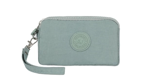 Detail of mint green water-resistant nylon phone bag with dual zippers and logo