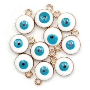 Detailed close-up of blue and white enamel evil eye pendants for DIY jewelry making