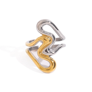 Polished titanium steel ring with wave design in gold and silver finish on white background