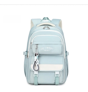Close-up of light blue large capacity student backpack with double zipper pockets and lettering