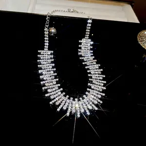 Sparkling rhinestone irregular fringe choker necklace with adjustable chain in silver finish