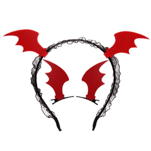Detail of red bat wing headband and hair clips with black lace for Halloween party costume