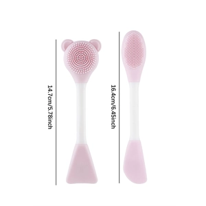 Dual-ended silicone face cleanser and mask brush set with size measurements in pink