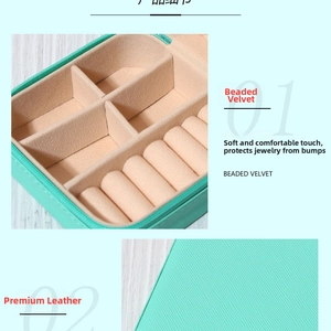 Detail of mint green PU leather jewelry box with bead velvet interior and ring slots