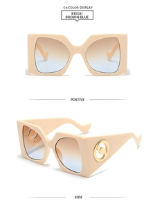 Detail view of beige square sunglasses with brown blue gradient lenses and gold decor
