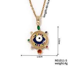 Detailed view of evil eye pendant with 40 plus 5cm chain and product measurements