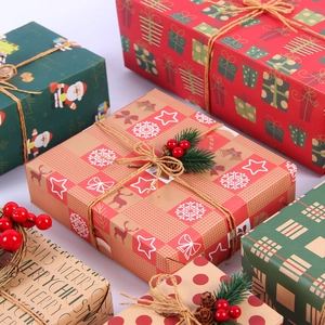 Vintage kraft Christmas wrapping paper set with festive prints and twine accents