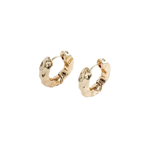 Golden chunky irregular circle earrings with lava texture and minimalist metal design