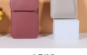 Detail of minimalist leather crossbody phone bags in dusty rose and light grey colors